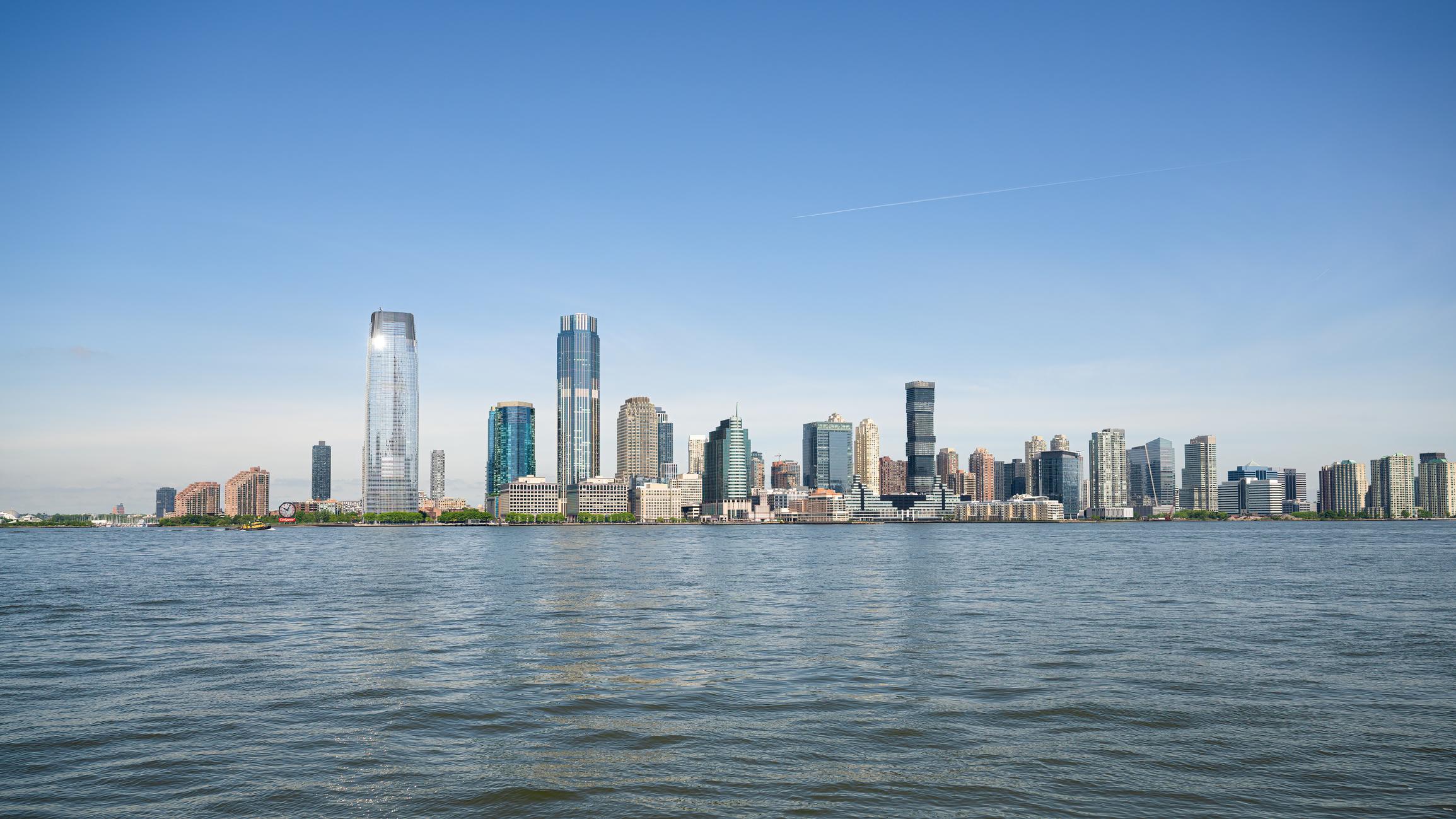 A view of Jersey City's skyline from across the water, showcasing a mix of high-rise buildings and glass towers on a sunny day with a bright blue sky.